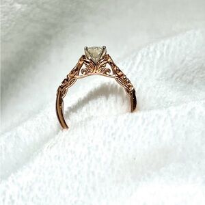 Custom made 24ct rose gold ring with 3/4 carat diamond. Size 7